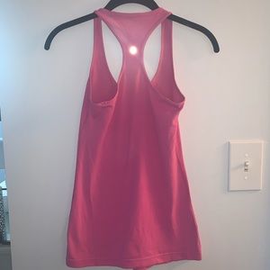 Pink lululemon workout top, razor back